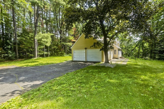 417 Billings Rd, Somers, CT 06071 - garage with asphalt driveway