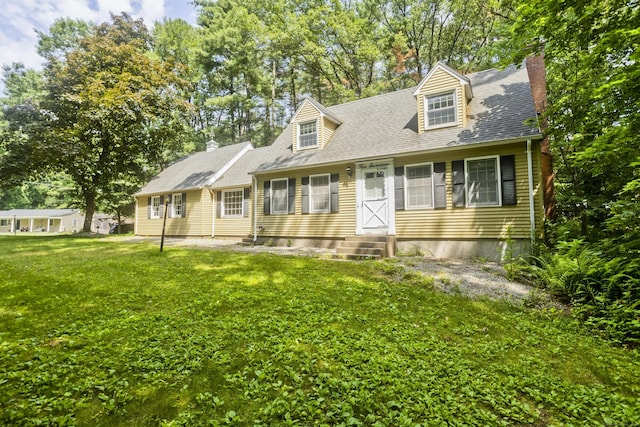 417 Billings Rd, Somers, CT 06071 - new england style home with a chimney, a front lawn, and roof with shingles