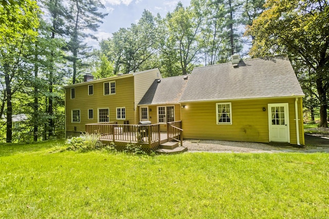417 Billings Rd, Somers, CT 06071 - back of property with a chimney, a wooden deck, a yard, and a shingled roof
