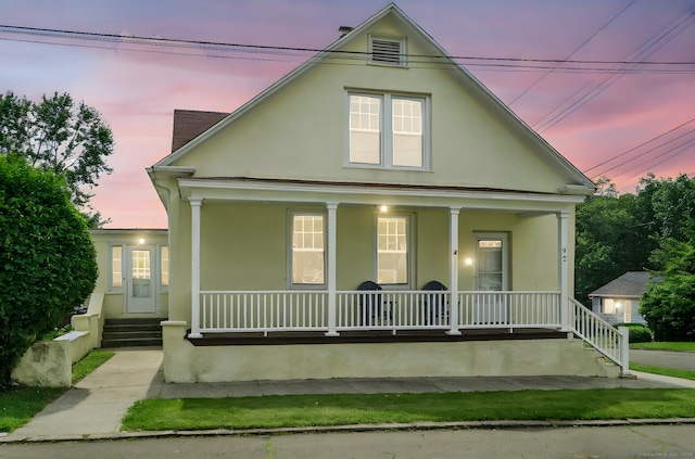 92 Yates St, West Haven, CT 06516 - neoclassical / greek revival house with covered porch and stucco siding