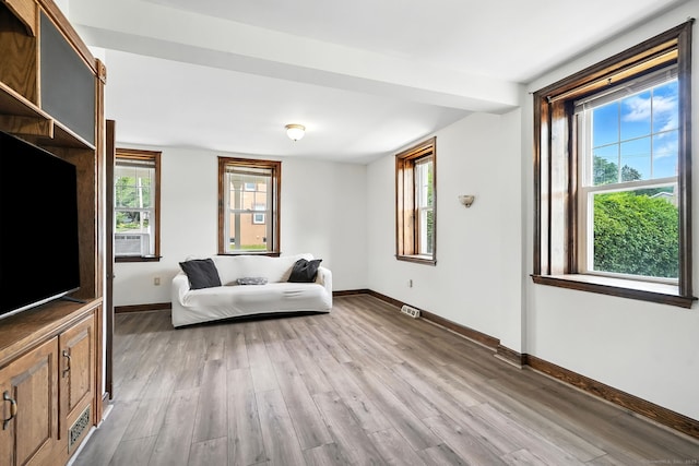 92 Yates St, West Haven, CT 06516 - living area featuring light wood-type flooring and cooling unit