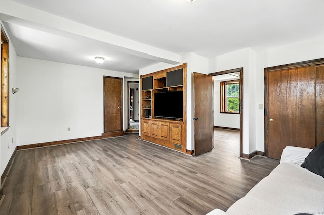 92 Yates St, West Haven, CT 06516 - unfurnished living room with baseboards and wood finished floors