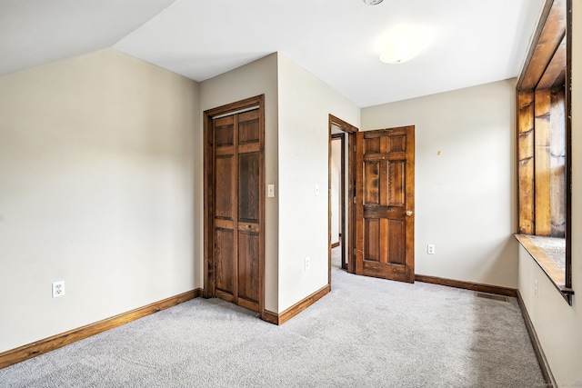 92 Yates St, West Haven, CT 06516 - unfurnished bedroom with carpet and vaulted ceiling