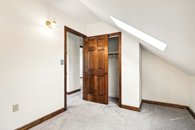 92 Yates St, West Haven, CT 06516 - additional living space with a skylight, vaulted ceiling, and light colored carpet