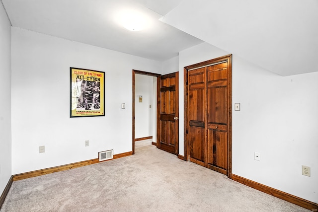92 Yates St, West Haven, CT 06516 - unfurnished bedroom with carpet and a closet