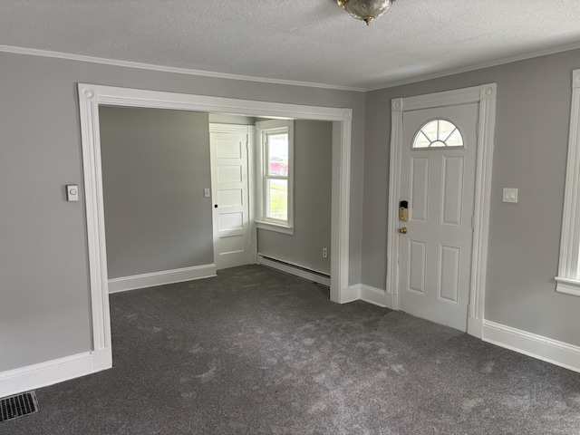 97 Capen St, Windsor, CT 06095 - entrance foyer with a baseboard radiator, dark colored carpet, plenty of natural light, a textured ceiling, and ornamental molding