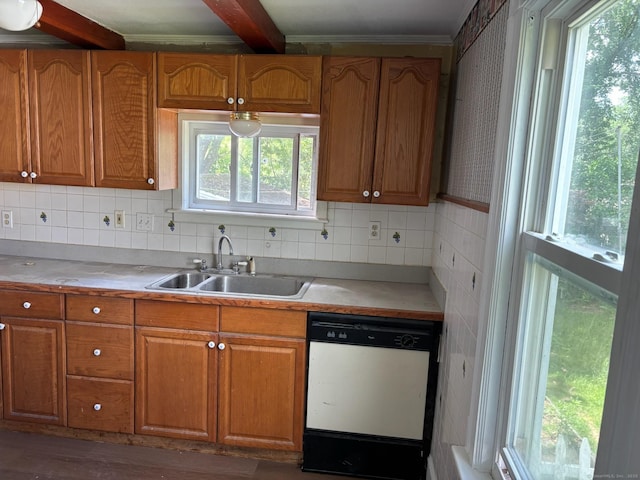 97 Capen St, Windsor, CT 06095 - kitchen with dishwashing machine, brown cabinetry, beam ceiling, light countertops, and tasteful backsplash