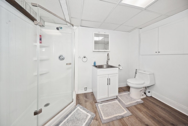69 Sills Dr, Watertown, CT 06779 - full bath with vanity, a stall shower, wood finished floors, and a paneled ceiling