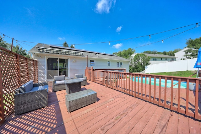 69 Sills Dr, Watertown, CT 06779 - deck with an outdoor hangout area and a fenced backyard