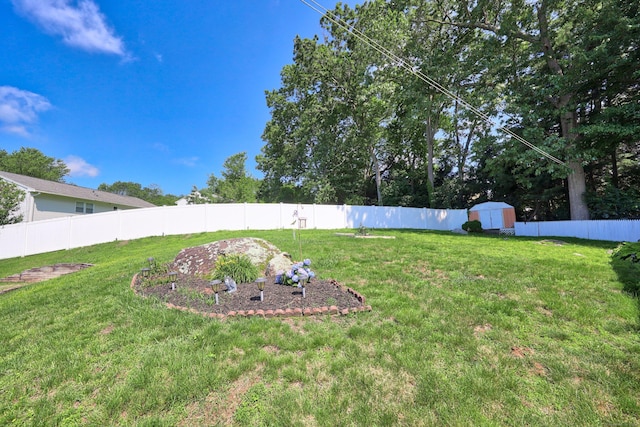 69 Sills Dr, Watertown, CT 06779 - fenced backyard featuring a storage shed