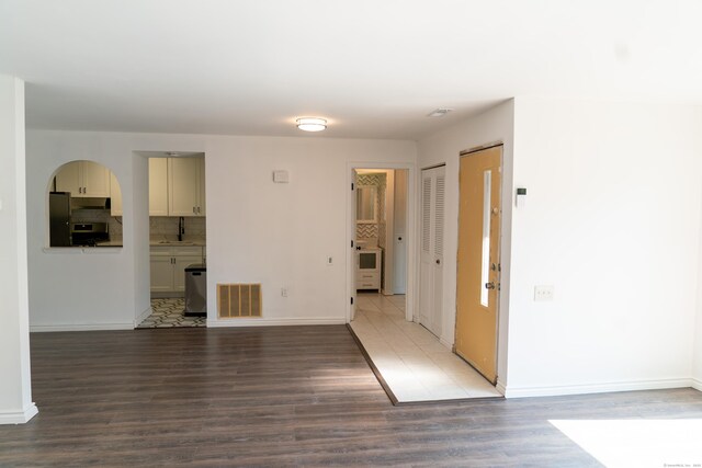 5 Melon Ln Unit 5, Ridgefield, CT 06877 - unfurnished room with a sink and wood finished floors