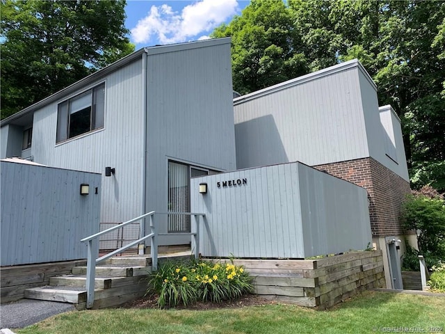 5 Melon Ln Unit 5, Ridgefield, CT 06877 - view of front of house with brick siding