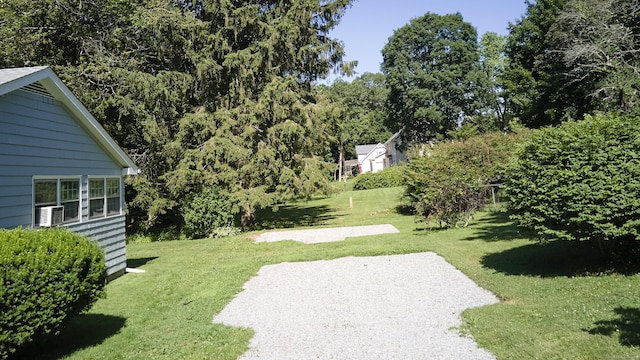 19 Eli Chapman Rd, East Haddam, CT 06469 - view of grassy yard with a patio area