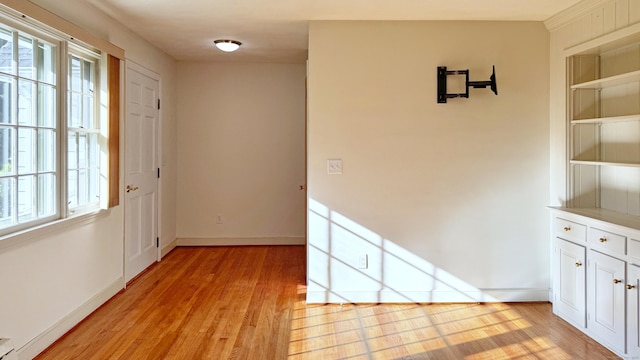 19 Eli Chapman Rd, East Haddam, CT 06469 - unfurnished dining area featuring plenty of natural light, light wood finished floors, and built in shelves
