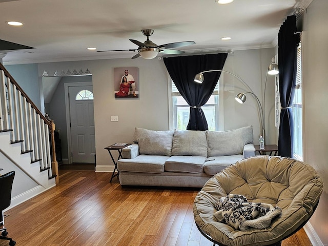 27 White Rose Ave, Waterbury, CT 06708 - living area with ornamental molding, stairs, a ceiling fan, light wood-type flooring, and recessed lighting