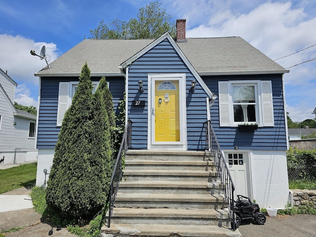 27 White Rose Ave, Waterbury, CT 06708 - bungalow with a chimney and roof with shingles