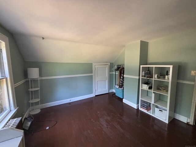 443 Todd Rd, Wolcott, CT 06716 - bonus room with vaulted ceiling, wood finished floors, and radiator