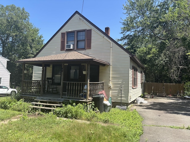 443 Todd Rd, Wolcott, CT 06716 - bungalow featuring covered porch and a chimney