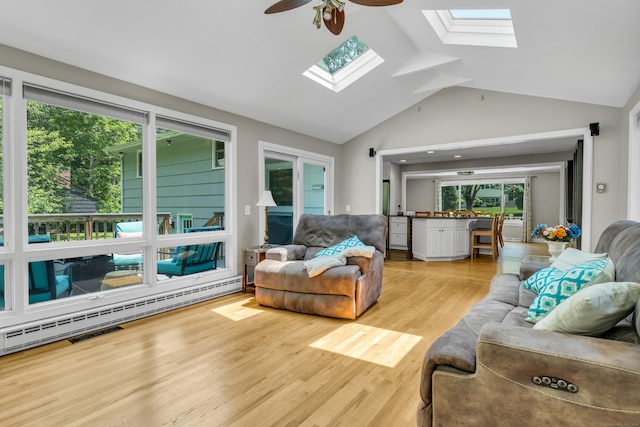 33 Woodside Rd, Guilford, CT 06437 - living area featuring a skylight, lofted ceiling, ceiling fan, and wood finished floors