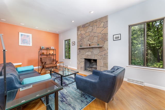 4 Coppergate Rd, East Granby, CT 06026 - living room with wood finished floors, a fireplace, and recessed lighting