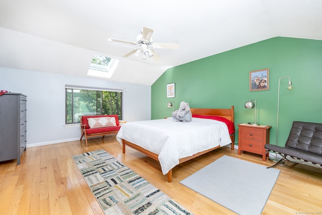 4 Coppergate Rd, East Granby, CT 06026 - bedroom with lofted ceiling, a skylight, light wood-type flooring, and a ceiling fan