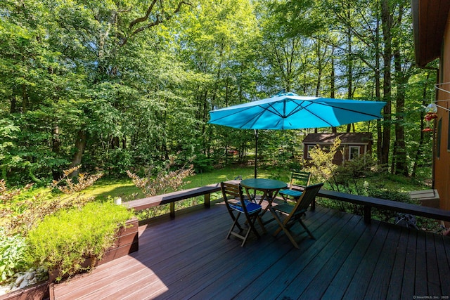 4 Coppergate Rd, East Granby, CT 06026 - deck featuring outdoor dining area and an outbuilding