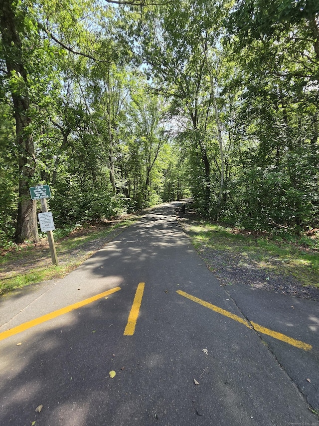 4 Coppergate Rd, East Granby, CT 06026 - view of road featuring a wooded view