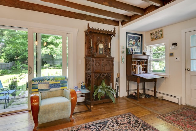 51 Moodus Leesville Rd, East Haddam, CT 06469 - living area featuring hardwood / wood-style floors, beam ceiling, a baseboard radiator, and a baseboard heating unit