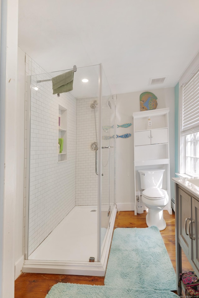 51 Moodus Leesville Rd, East Haddam, CT 06469 - bathroom featuring a stall shower, vanity, and wood finished floors
