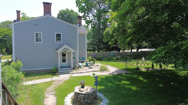 51 Moodus Leesville Rd, East Haddam, CT 06469 - back of property featuring a chimney