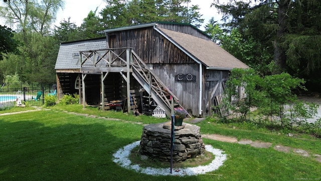 51 Moodus Leesville Rd, East Haddam, CT 06469 - back of property with stairs and a deck
