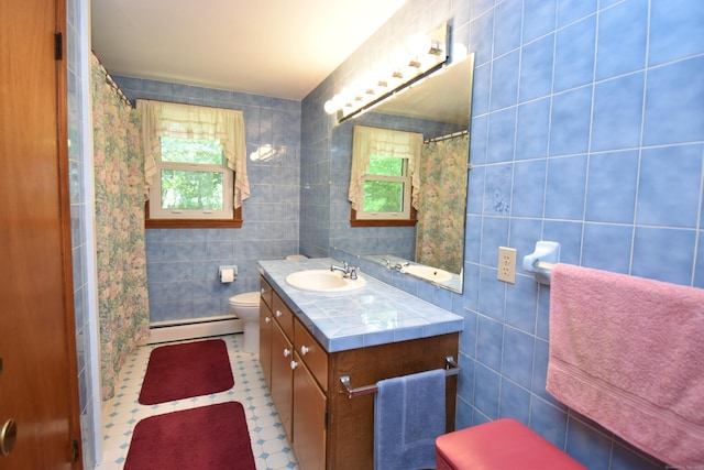 81 Birchwood Dr, Torrington, CT 06790 - full bathroom featuring a baseboard radiator, vanity, tile walls, and a shower with curtain