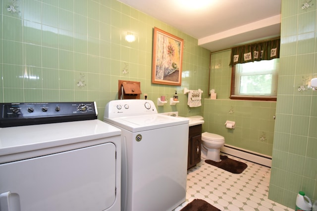 81 Birchwood Dr, Torrington, CT 06790 - washroom featuring baseboard heating, tile walls, and washer and dryer