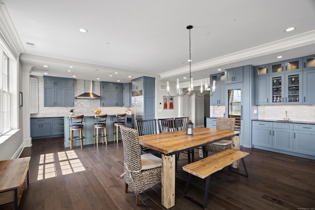 66 High St Unit 31, Guilford, CT 06437 - dining room with recessed lighting, a chandelier, dark wood-type flooring, and crown molding