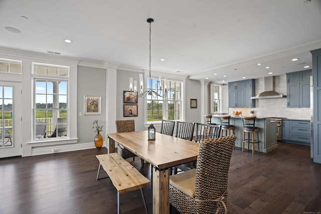66 High St Unit 31, Guilford, CT 06437 - dining room with a chandelier, dark wood-style flooring, crown molding, and recessed lighting