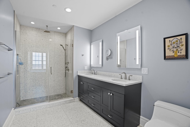 66 High St Unit 31, Guilford, CT 06437 - bathroom with double vanity, a shower stall, and recessed lighting