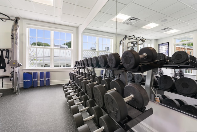 66 High St Unit 31, Guilford, CT 06437 - exercise room featuring a paneled ceiling and baseboards