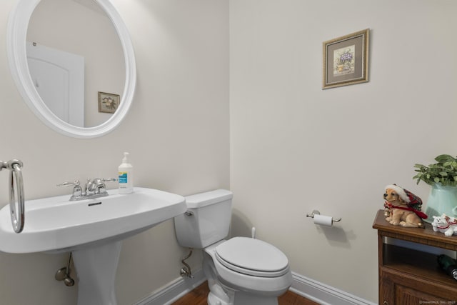 12 Sampson Ter Unit 12, Danbury, CT 06810 - bathroom featuring toilet and wood finished floors
