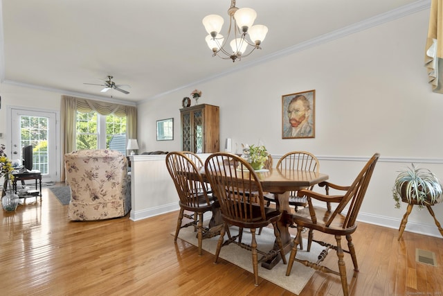 12 Sampson Ter Unit 12, Danbury, CT 06810 - dining space with light wood-style flooring, ornamental molding, ceiling fan, and a chandelier