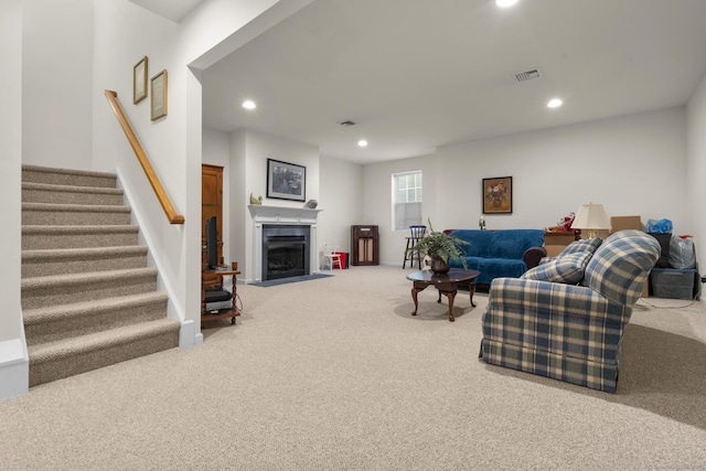 12 Sampson Ter Unit 12, Danbury, CT 06810 - living room with carpet, stairway, recessed lighting, and a fireplace with flush hearth