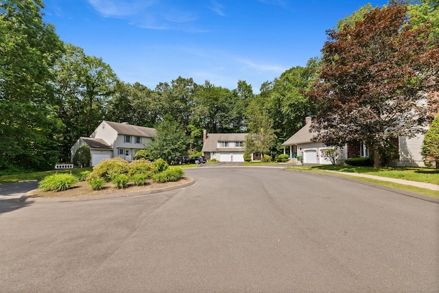 13 Waterview Dr, Windsor, CT 06095 - view of front of property with a residential view, driveway, and an attached garage