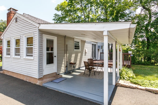 49 Remington Rd, Windsor, CT 06095 - wooden terrace featuring outdoor dining area