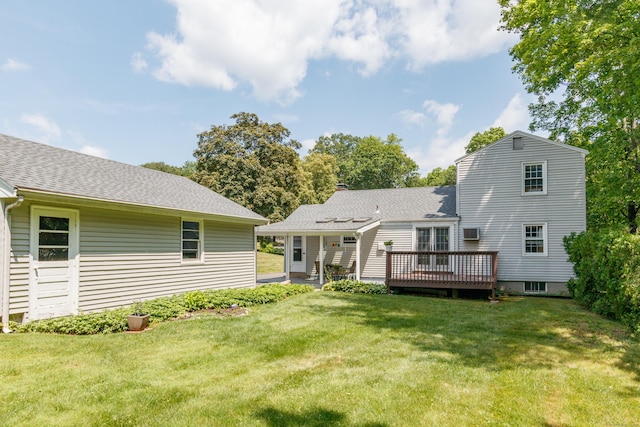 49 Remington Rd, Windsor, CT 06095 - rear view of house featuring a shingled roof, a lawn, and a deck