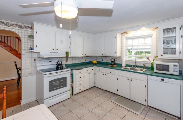 49 Remington Rd, Windsor, CT 06095 - kitchen featuring white appliances, under cabinet range hood, white cabinetry, and light tile patterned floors