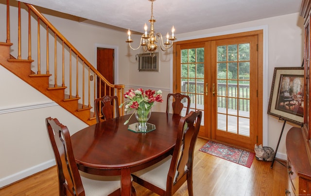 49 Remington Rd, Windsor, CT 06095 - dining area with stairs, wood finished floors, and a chandelier