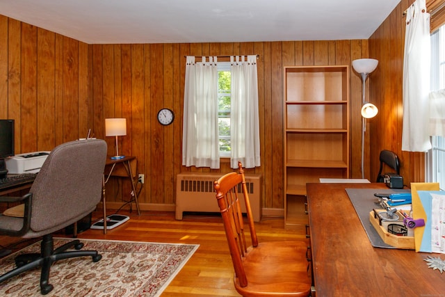 49 Remington Rd, Windsor, CT 06095 - office area featuring radiator, wood finished floors, and wooden walls