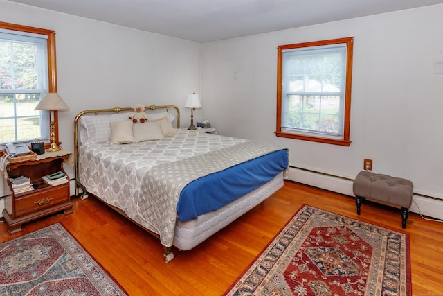 49 Remington Rd, Windsor, CT 06095 - bedroom featuring wood finished floors and baseboard heating