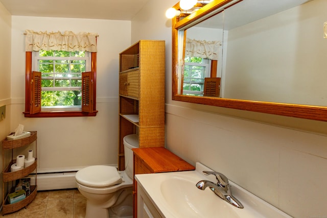 49 Remington Rd, Windsor, CT 06095 - bathroom featuring a baseboard radiator, vanity, and tile patterned floors