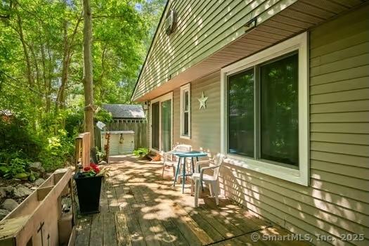 27 Laurelwood Dr, East Lyme, CT 06357 - view of property exterior with a wooden deck