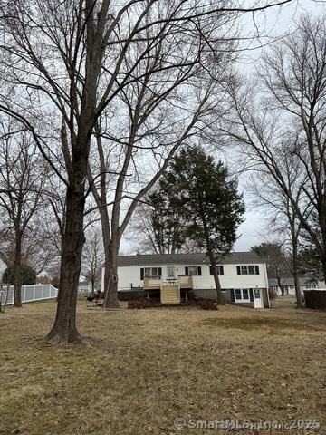 90 Diane Dr, South Windsor, CT 06074 - view of front facade with a deck and a front lawn